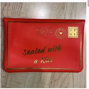 LIKE NEW red ipsy mini envelope clutch bag, makeup bag, "Sealed with a Kiss"